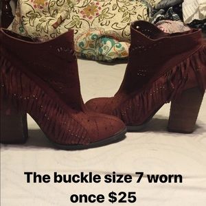 The buckle Rust colored booties with fringe